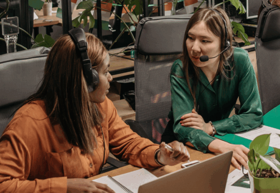 two women in customer support who discuss feedback
