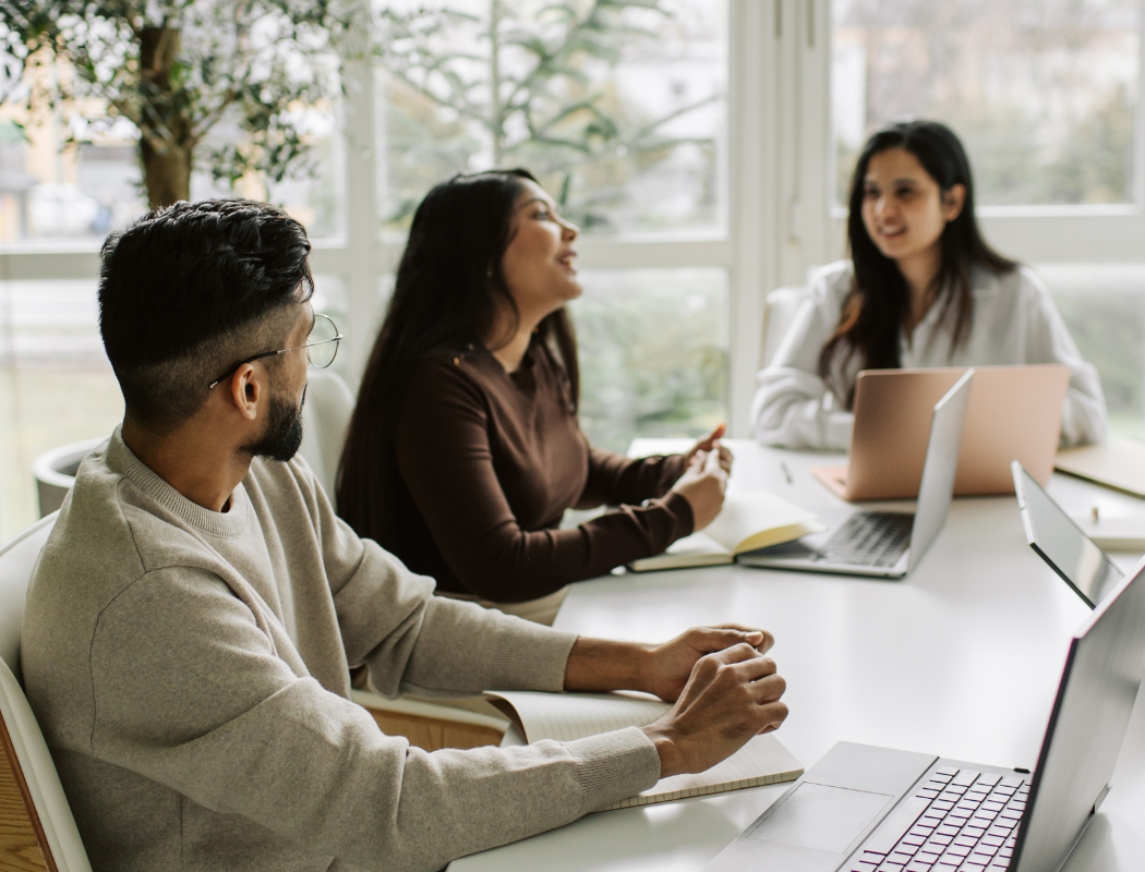 Employees in an environment where they share CX data
