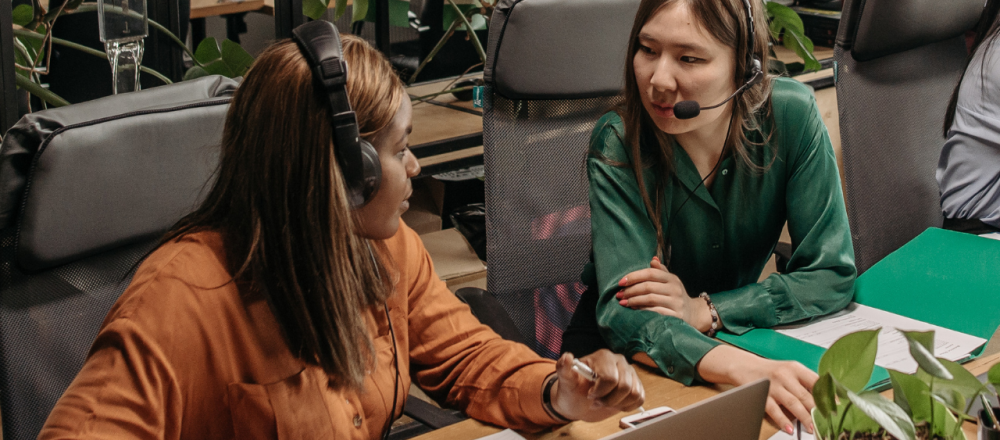 two women in customer support who discuss feedback