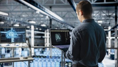 Data center IT specialist monitoring AI LLM visualization output